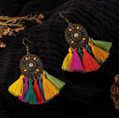 Aretes bohemios de flor de sol retro tótem