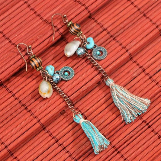 Aretes con borlas y flecos